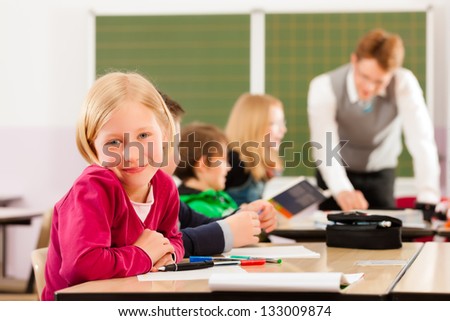 Education Pupils and teacher learning at elementary or primary school in the classroom Education Pupils and teacher learning at elementary or primary school in the classroom