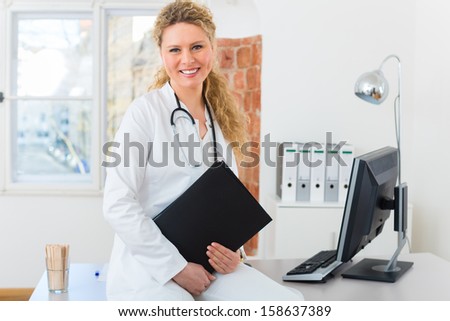 Young female doctor sitting on a desk in front of window in clinic with test results in a file or dossier