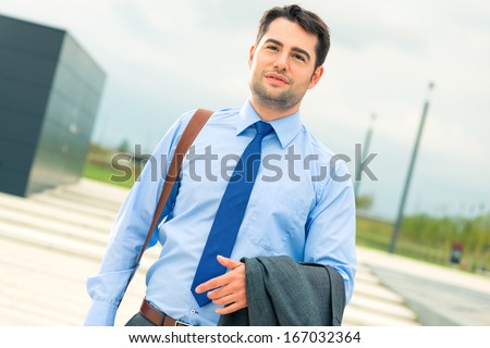 Handsome businessman or manager in leisure time going home