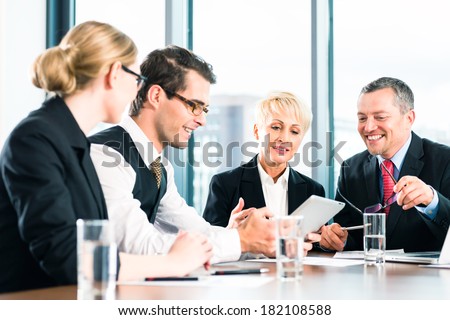 Business - meeting in office, the businesspeople or lawyers in team are discussing a document on Laptop computer