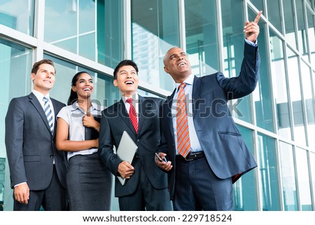 Indian Leader explaining his vision giving outlook to his business team in Asia