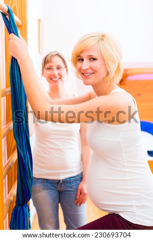 Midwife doing pregnancy gymnastics in her practice