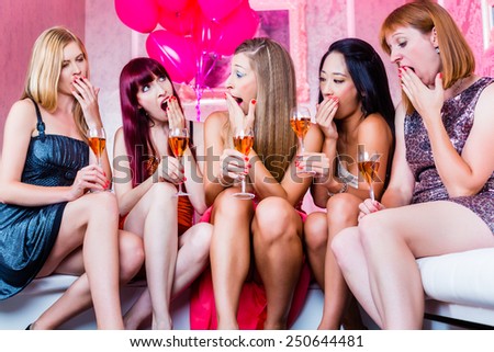 Women partying with champagne in club until morning rises, they are tired