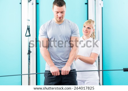 Patient at the physiotherapy doing physical exercises using flexi bar