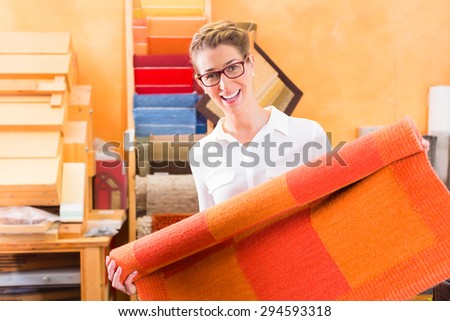 Interior Designer buying rug or carpeting in home improvement store