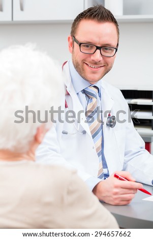 Doctor seeing senior patient in practice