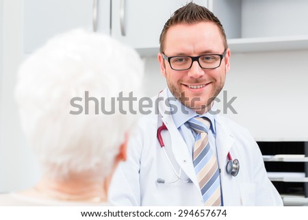 Doctor seeing senior patient in practice