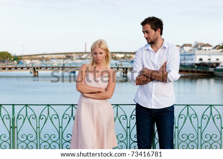 Couple having a discussion in summer in their vacation