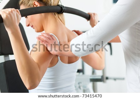 Patient at the physiotherapy making physical exercises