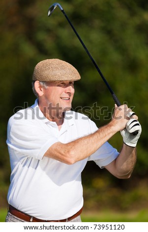 Golfer Ã¢Â?Â? only torso to be seen - doing a golf stroke, he is playing on a wonderful summer afternoon