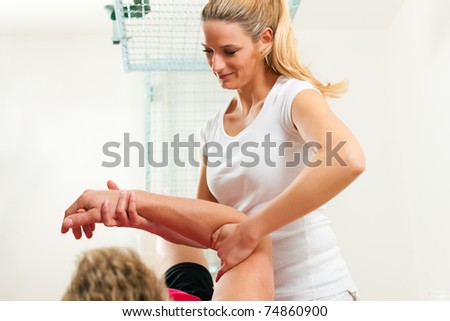 Patient at the physiotherapy doing physical exercises