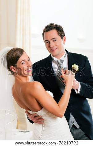 stock photo Bride and groom dancing the first dance at their wedding day