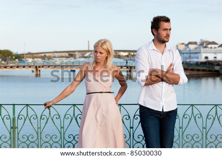 Couple having a discussion in summer in their vacation