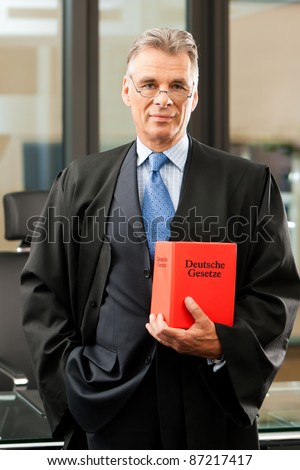 German Lawyer with civil law code in a court room