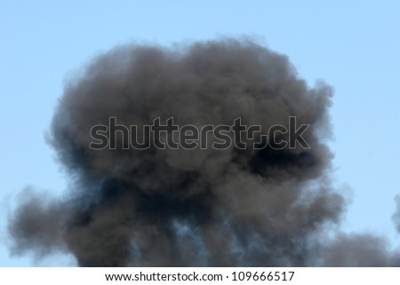 billowing black smoke