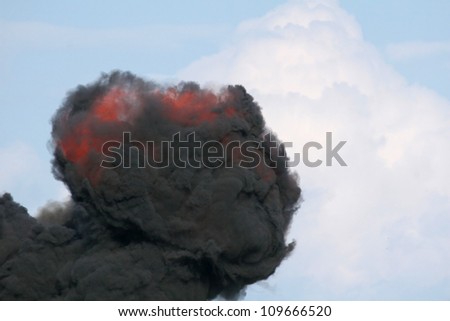billowing black smoke