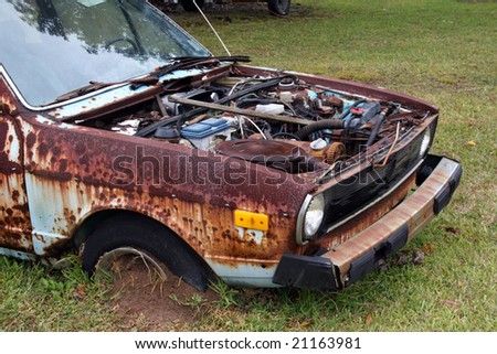 stock photo Rusted Out Old Car