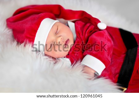 Santa sleeping newborn