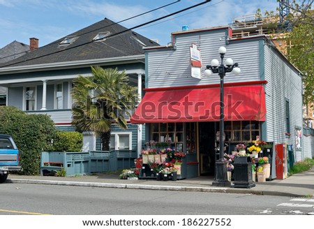 VICTORIA, BC - CIRCA APRIL 2014 - Government Street corner store. Small local business operated grocery store in downtown Victoria.