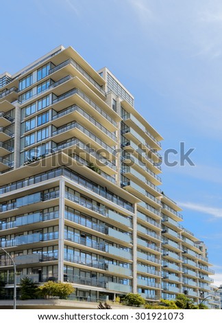 Condominium or apartment building with asymmetrical, stair-step architecture in the city downtown.