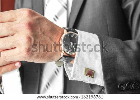 business man hand with wrist watch