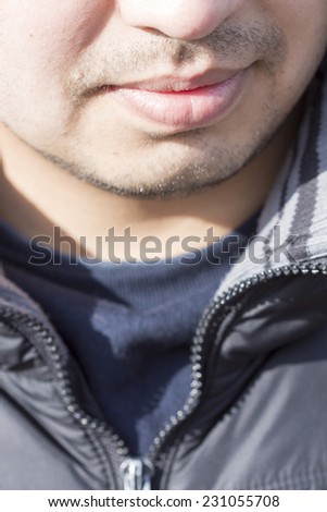 Men\'s face. Close up of the neck and shirt jacket