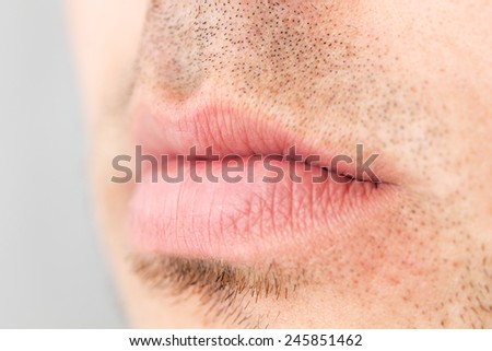 Men\'s short beard and lips close up