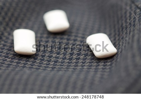 chewing gum on a black background