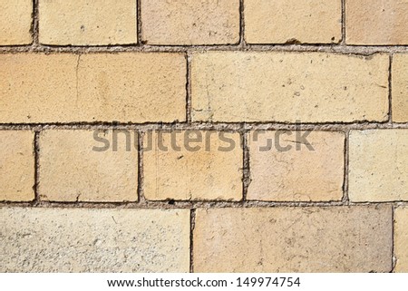 Background texture of old yellow colored Victorian bricks and mortar
