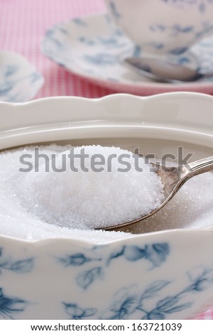 Spoonful of sugar in a sugar bowl