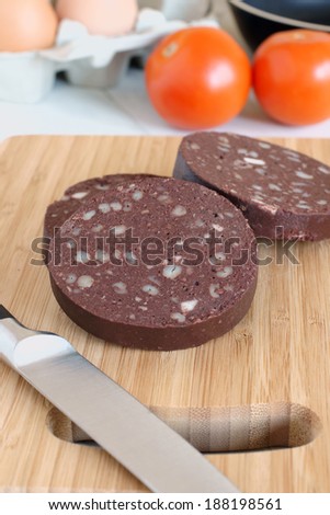 Black pudding a British type of blood sausage containing onions, pork fat, oatmeal and pig\'s blood