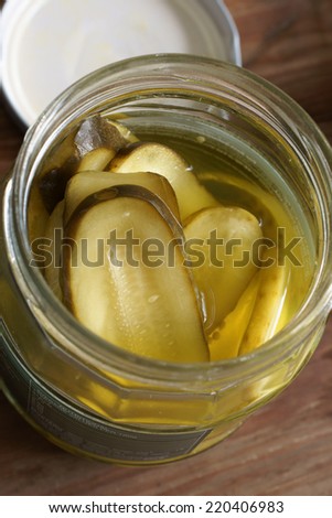 Sliced pickles or pickled gherkins in vinegar