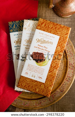 NAPIER, NEW ZEALAND - JULY 20, 2015: Whittaker\'s New Zealand Artisan Collection chocolate range. Made with local New Zealand flavours. J.H. Whittaker\'s is the biggest chocolate brand in New Zealand.