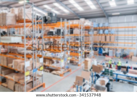 Modern distribution warehouse with blur applied to image