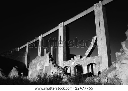 Industrial crisis - abandoned factory - black and white photo