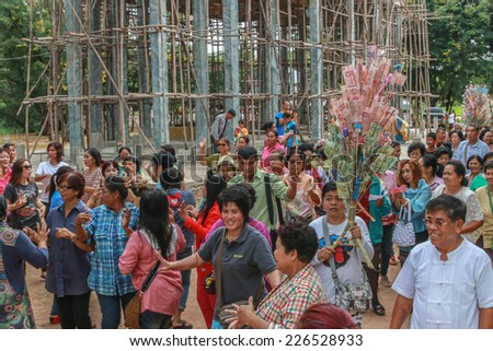 CHAIYAPHUM, THAILAND - OCTOBER 18. Many people do not know the name of Thailand joining merit. Year October 18, 2014 at Chaiyaphum, Thailand.