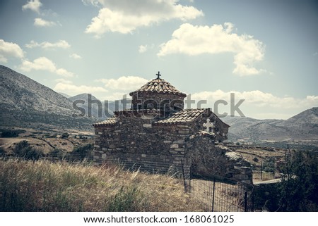 vintage style photo of an ancient greek church.