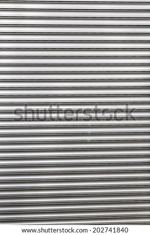 dirty old roller shutter for backgrounds.