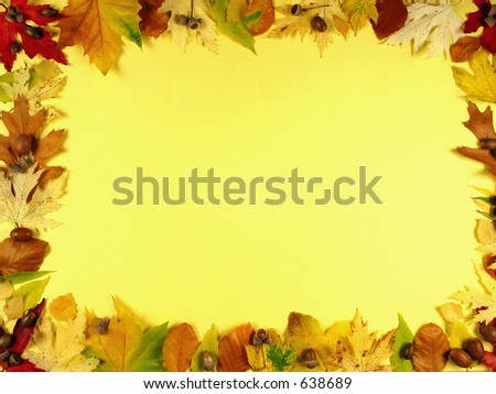 Beautiful frame of autumn leafs on warm yellow background