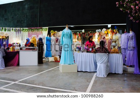 LUMUT, MALAYSIA - APR 22: Wedding photographer booth from Amanda Studio promote their services to visitors during Perak Bridal Carnival at Marina Island Hall on Apr 22, 2012 in Lumut Perak, Malaysia.