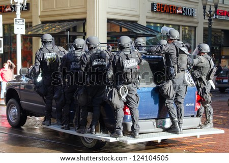 PORTLAND, OREGON - NOV 17: Oregon State Trooper in Riot Gear on Vehicle in Downtown Portland, Oregon during a Occupy Portland protest on the first anniversary of Occupy Wall Street November 17, 2011
