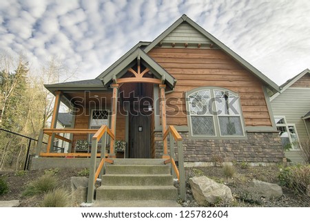Bungalow House with Front Covered Porch Stair Steps and Landscaping