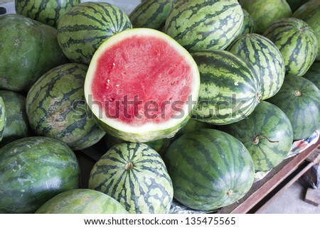 Watermelons Seedless Whole and Halved at Fruit Stand