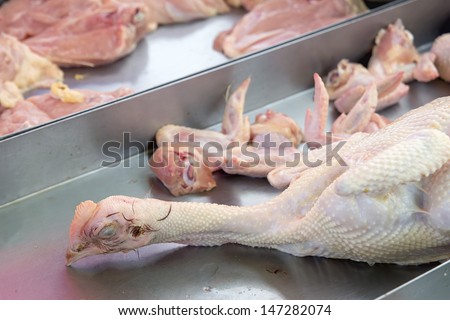 Slaughtered Fresh Whole Chicken with Head Wings Breast Meat at Wet Market in Southeast Asia