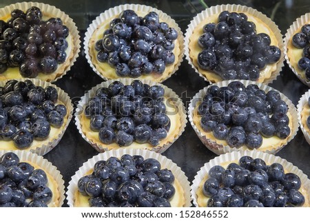 Lemon Curd Fruit Tarts with Blueberries at Bakery Shop