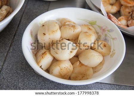 Cooked Pan Seared Sea Scallops as Ingredients for Chinese Big Feast Bowl Closeup