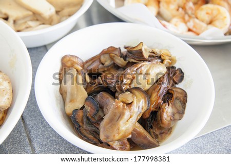 Smoked Oysters as Ingredients for Chinese New Year Big Bowl Feast Dish Closeup