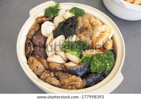 Poon Choi Hong Kong Cantonese Cuisine Big Feast Bowl  with Seafood and Vegetables for Chinese New Year Dinner