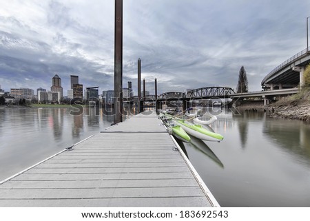 Moorage at Portland Downtown Waterfront on the Willamette River with City Skyline at Dusk