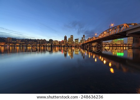 Portland Oregon Downtown City Skyline Along Willamette River by the Hawthorne Bridge at Evening Blue Hour